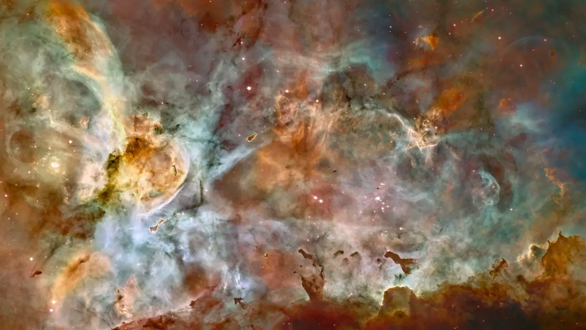 The image shows particles ejected by stars, which help to form the marvellous clouds of gas and dust that make up the Carina Nebula.